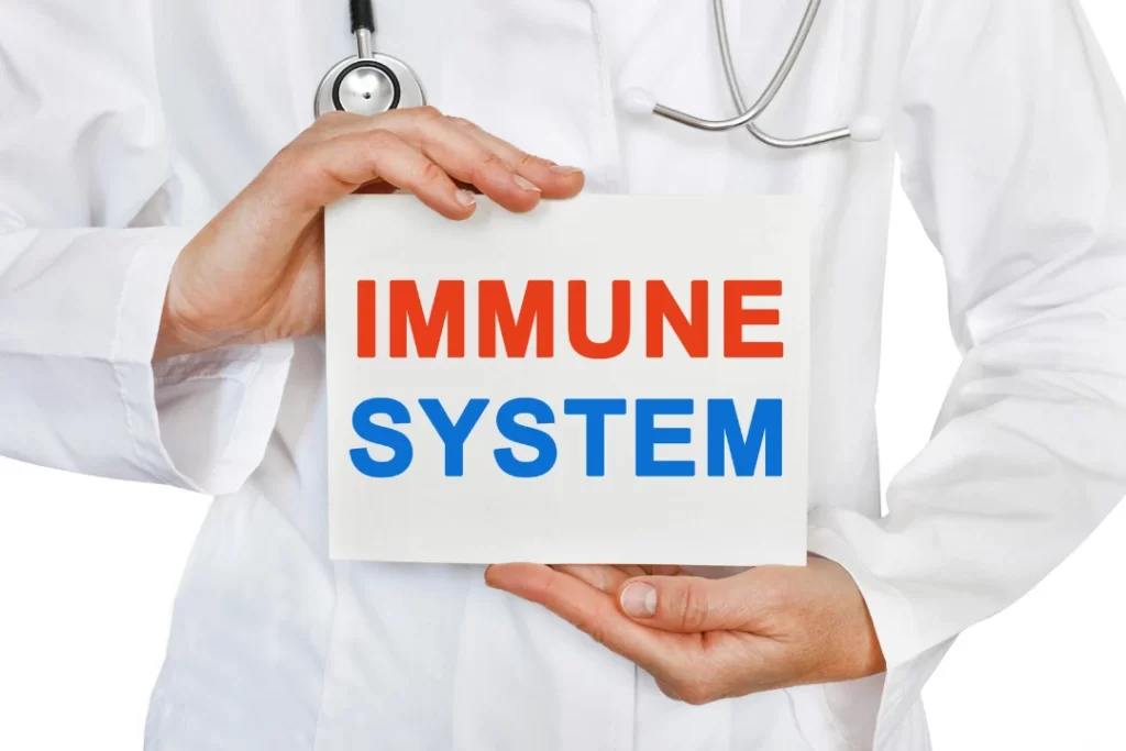 Immune system is written on white label card held by a doctor.