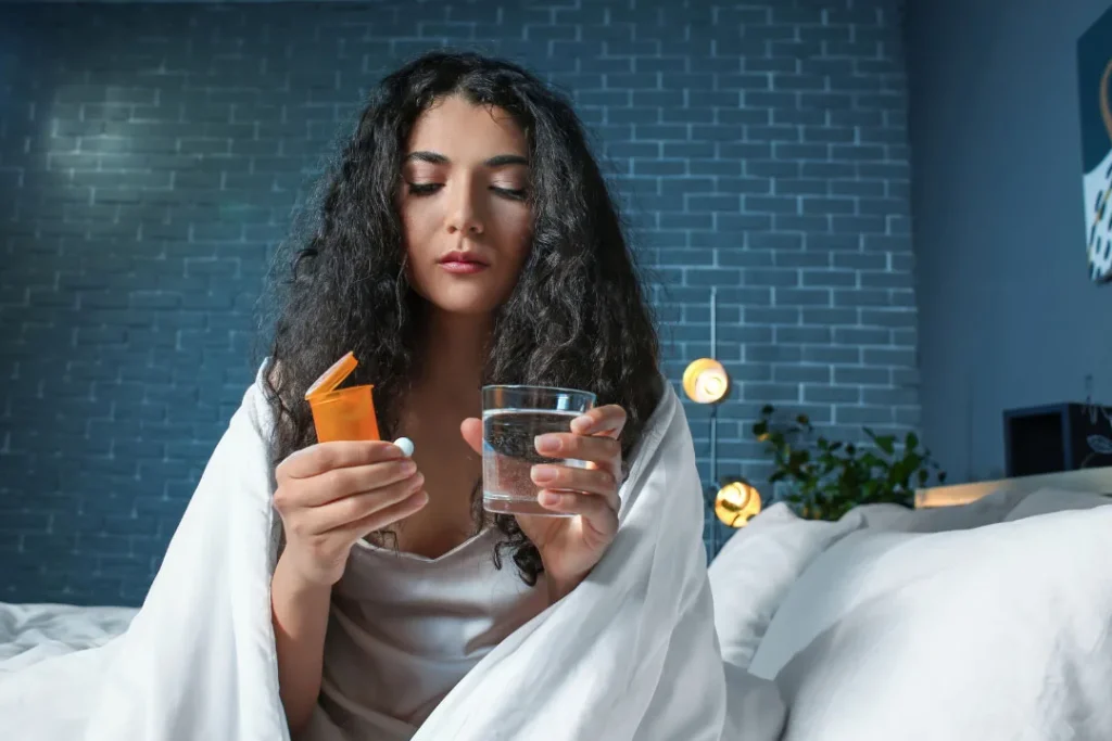 A young girl having sleep supplement.