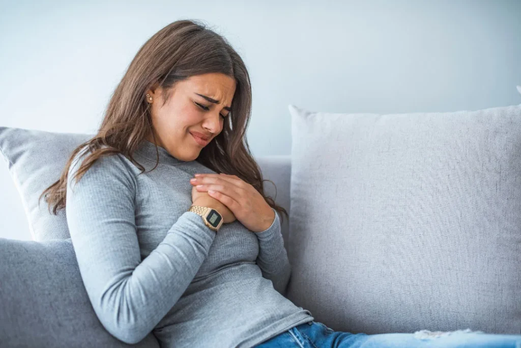 A young girl facing chest pain. 