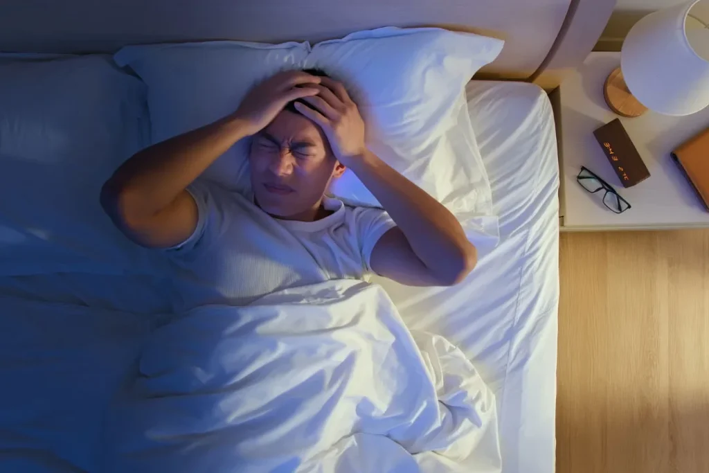 A young man going through insomnia.