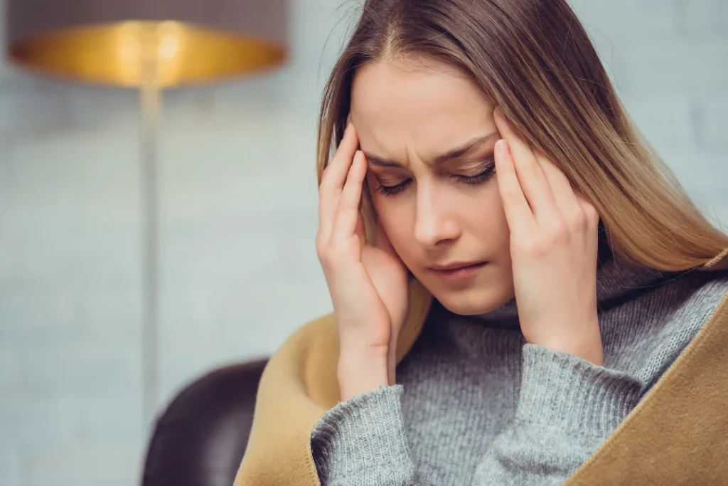 A girl having headache.