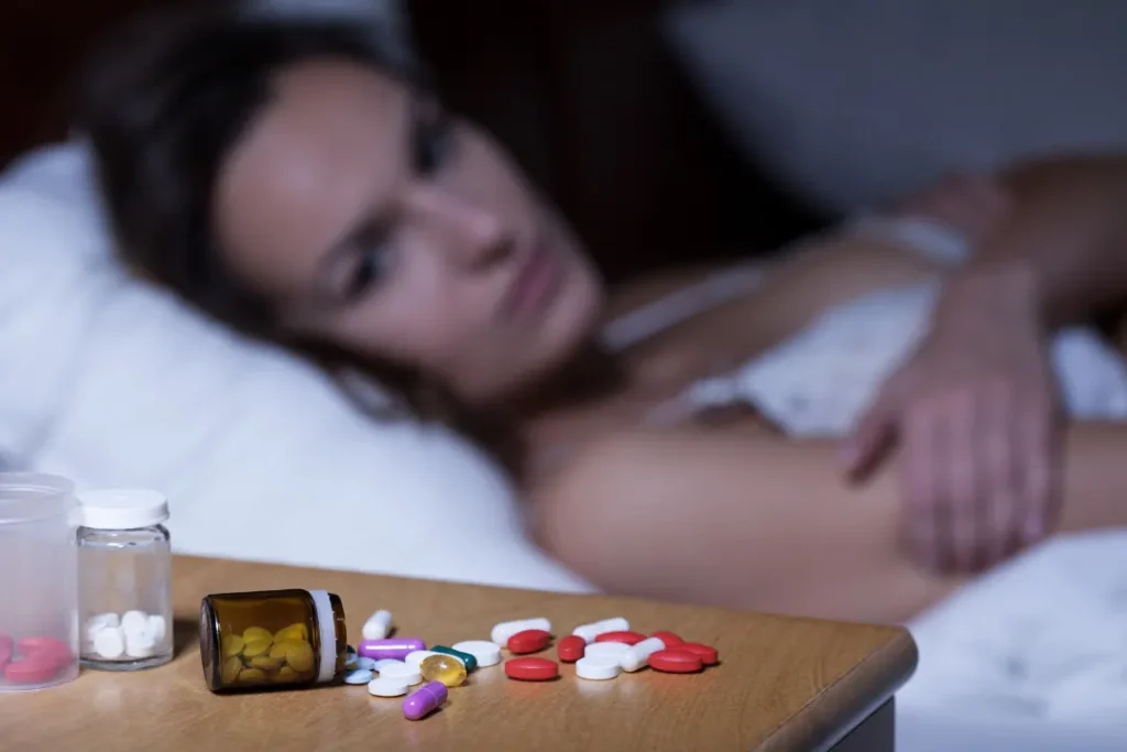 woman unable to sleep even after taking sleeping pills