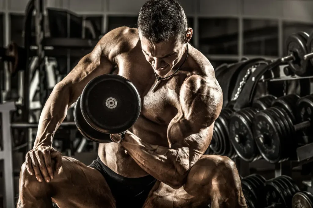 muscular man posing at the gym